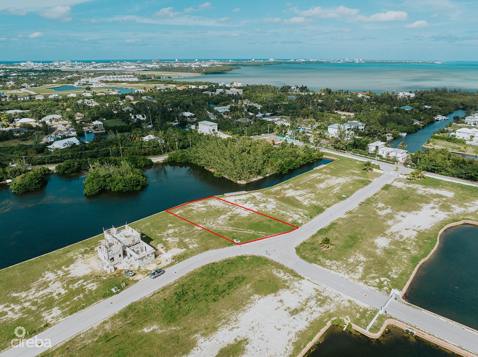 LARGEST LOT IN MUSTIQUE COVE - 0.31 ACRE CANAL LOT