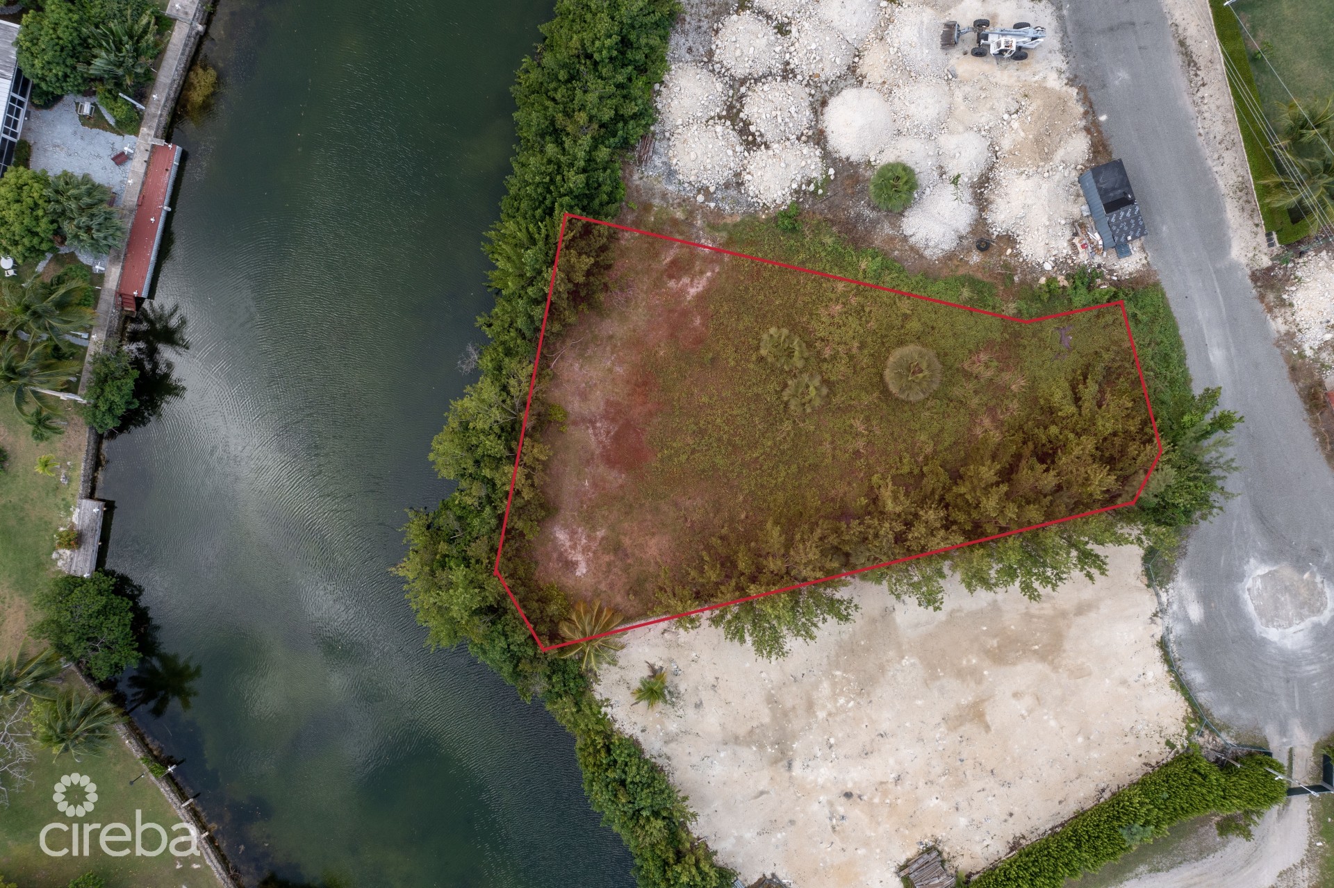 0.33 ACRE CANAL FRONT LAND ON SWEETLEAF CLOSE 0.33 ACRE CANAL FRONT LAND ON SWEETLEAF CLOSE