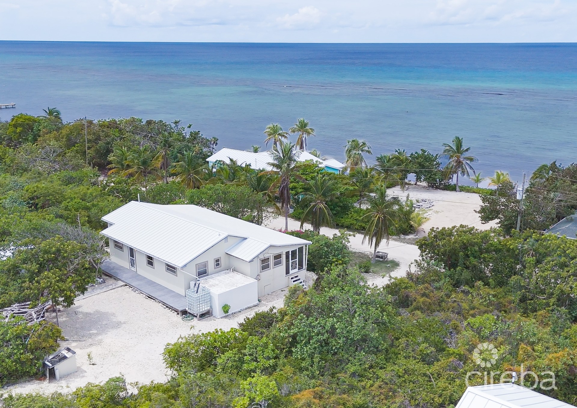 LITTLE CAYMAN OCEAN VIEW RESIDENTIAL HOME WITH BEACHFRONT LOT