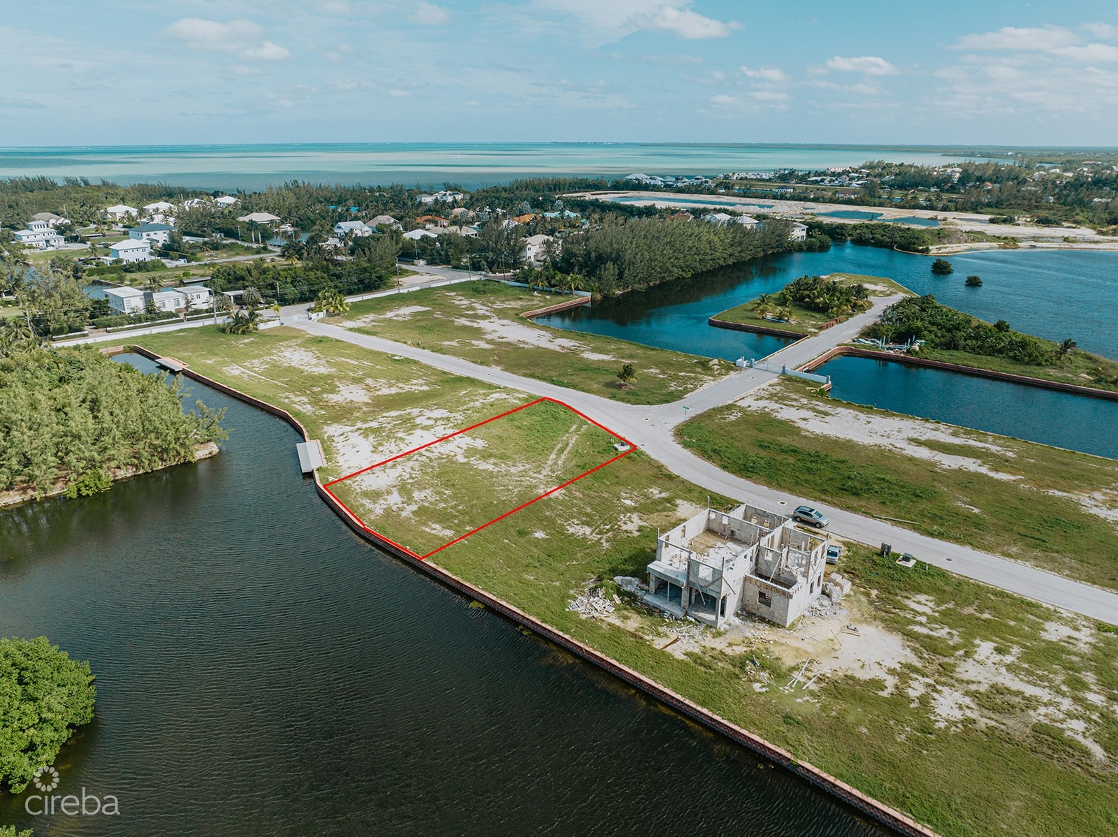 LARGEST LOT IN MUSTIQUE COVE - 0.31 ACRE CANAL LOT