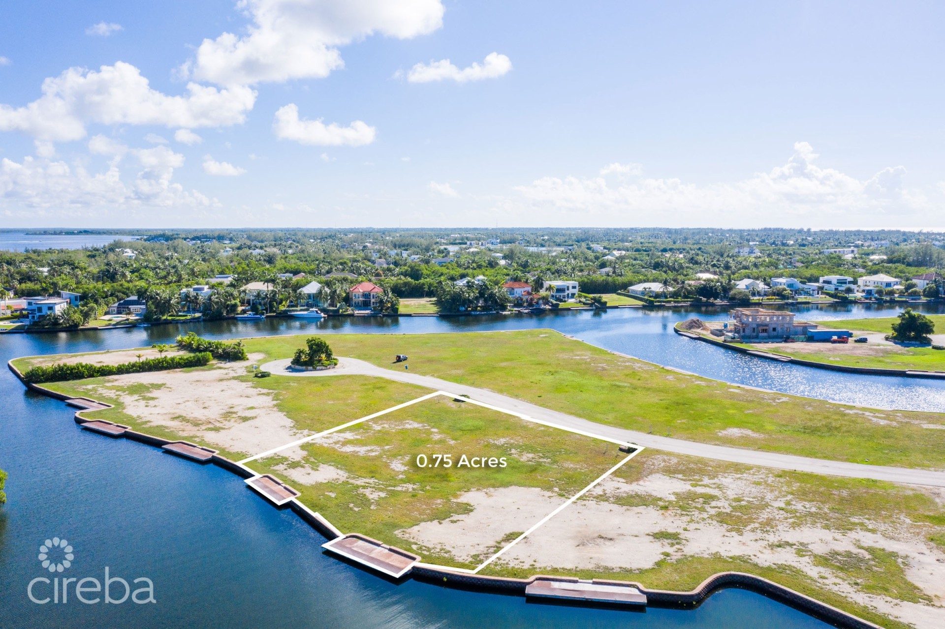 HARBOUR REACH 0.75 ACRE, CANAL FRONT LAND