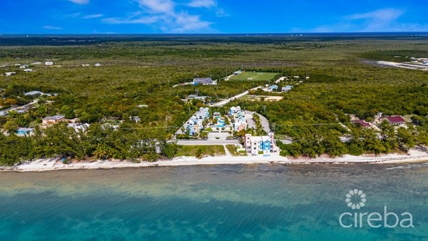 EAST END PARADISE VILLAS.  3 BED, 3 BATH + DEN WITH PRIVATE BEACH