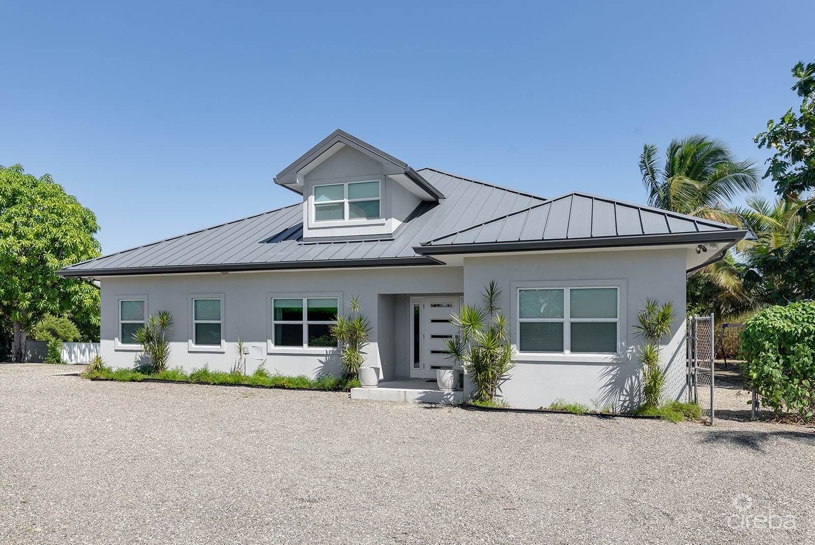 ELEVATED, 6-BEDROOM  SINGLE FAMILY HOME ON A MASSIVE PARCEL