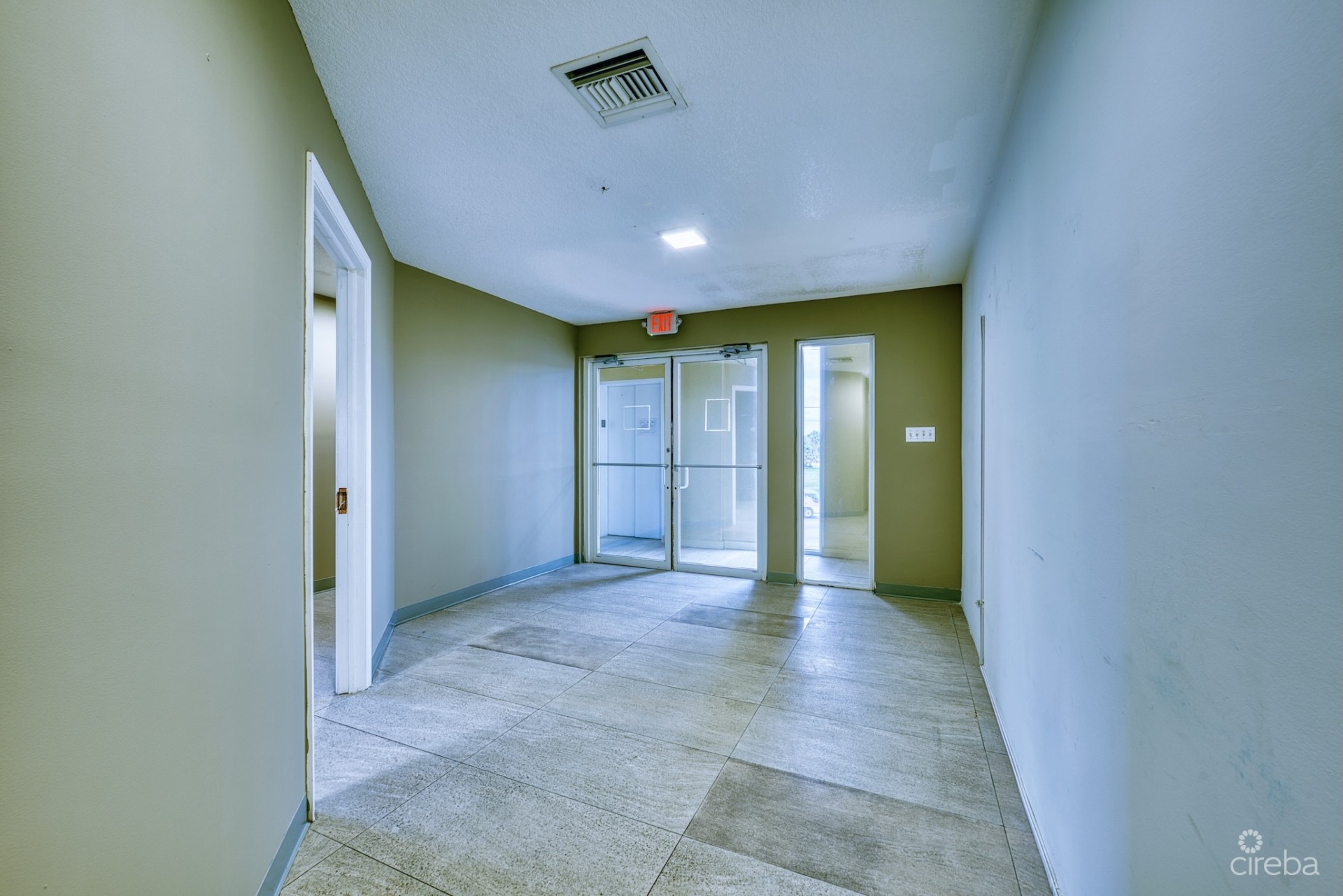 PALM GROVE COMMERCIAL INVESTMENT | FULLY TENANTED  OFFICE SUITE IN GEORGE TOWN