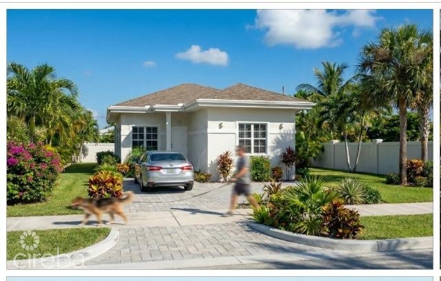 WEST BAY RESIDENTIAL LOT WITH APPROVED 3 BED/2 BATH PLANS AND BUILDING PERMIT.