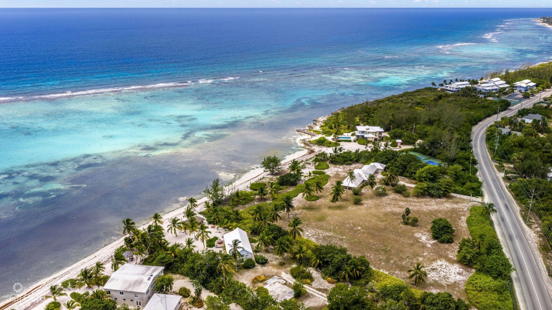 BODDEN TOWN HOTEL/TOURISM BEACHFRONT ACREAGE & COTTAGE