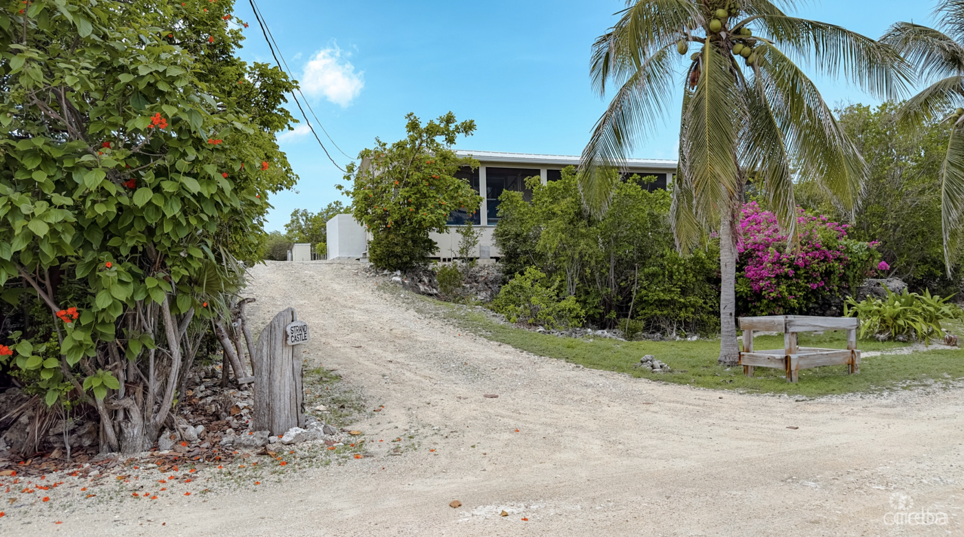 LITTLE CAYMAN OCEAN VIEW RESIDENTIAL HOME W/ BEACHFRONT LOT JUST SHY OF 1 ACRE