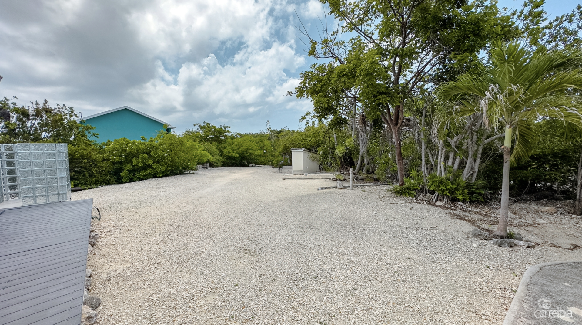 LITTLE CAYMAN OCEAN VIEW RESIDENTIAL HOME W/ BEACHFRONT LOT JUST SHY OF 1 ACRE