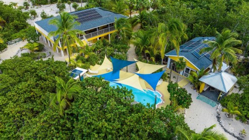 TROPICAL RUNAWAY - CAYMAN BRAC BEACHFRONT TROPICAL RUNAWAY - CAYMAN BRAC BEACHFRONT